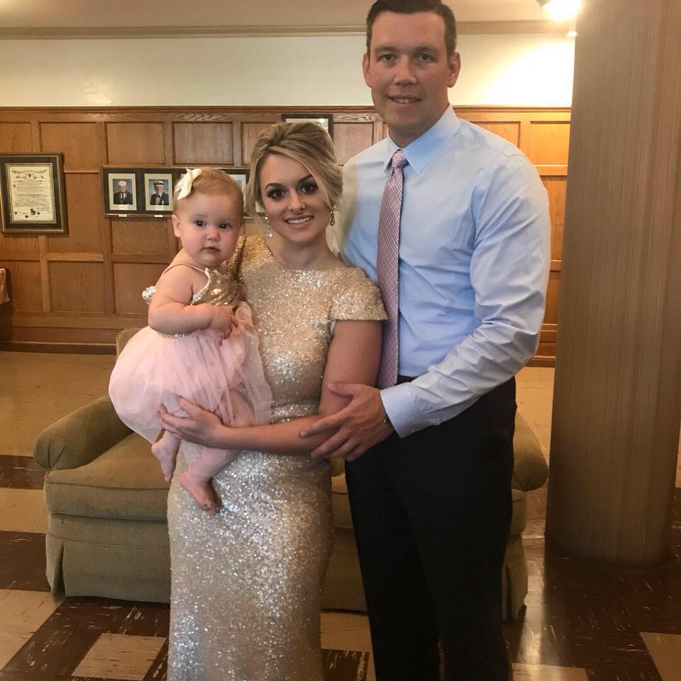 A Baptist Health employee with his family enjoying the benefits of the on site preschool center, a Baptist Health employee benefit.
