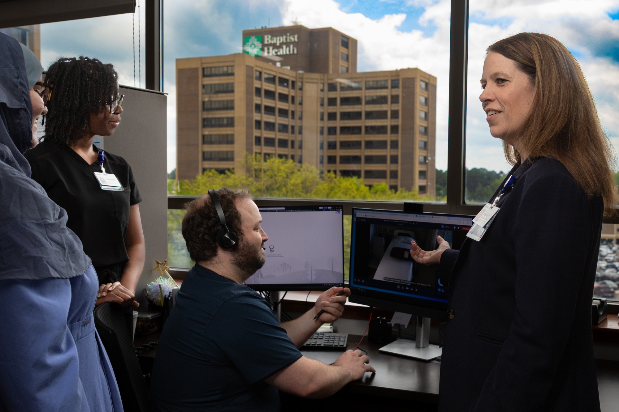 A female employee at Baptist Health with a leadership role