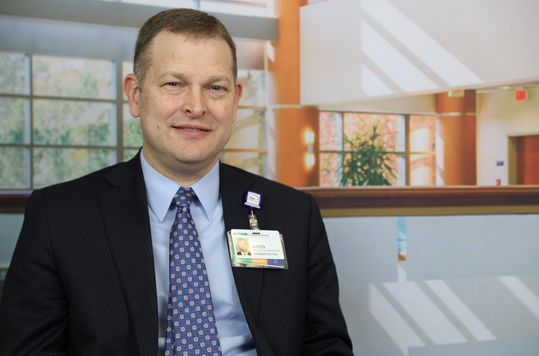 A female employee at Baptist Health with a leadership role