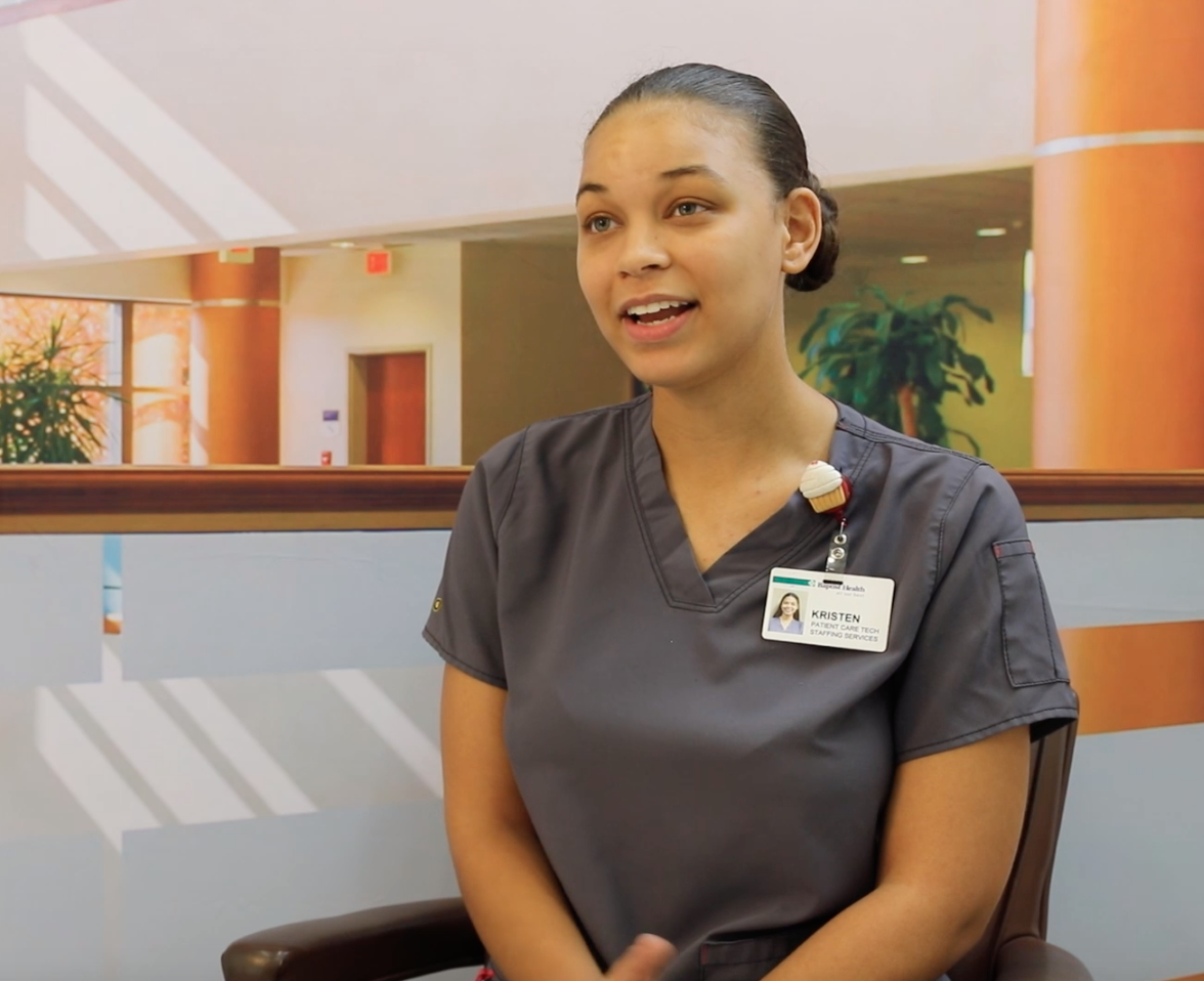 A happy Baptist Health employee in a hospital in Arkansas