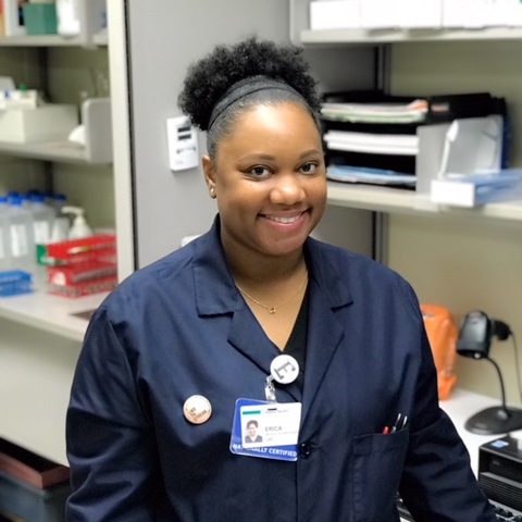 A Baptist Health career professional smiling in her office