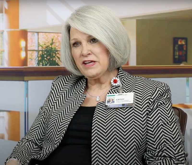 A female employee at Baptist Health with a leadership role