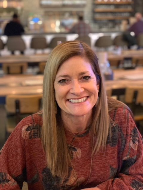  smiling lady enjoying Baptist Health Employee Benefits in Arkansas